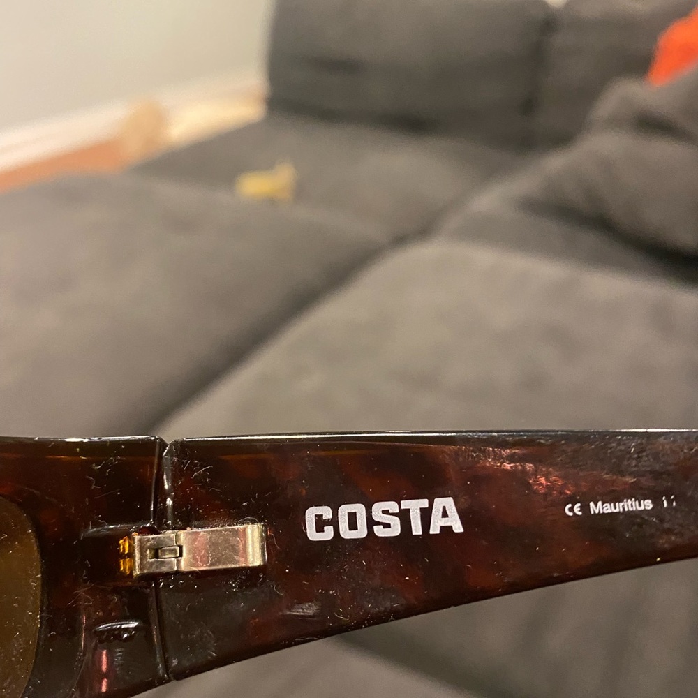 2 pairs polarized sunglasses Maui Jim and COSTA. $100/$175 both